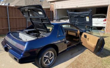 Pontiac-Fiero-1984-Blue-Tan-28