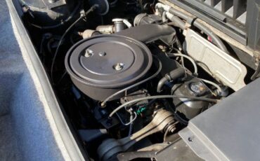 Pontiac-Fiero-1984-Blue-Tan-8