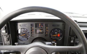 Pontiac-Fiero-1984-White-Dark-Gray-21