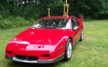 Pontiac-Fiero-1985-RedGray-Brown-ClothLeather