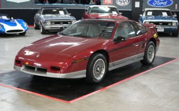 Pontiac-Fiero-1987-Maroon-Gray-1