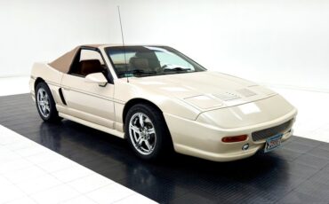 Pontiac-Fiero-1988-Pearl-White-Saddle-11