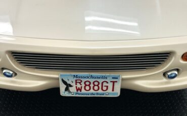 Pontiac-Fiero-1988-Pearl-White-Saddle-13