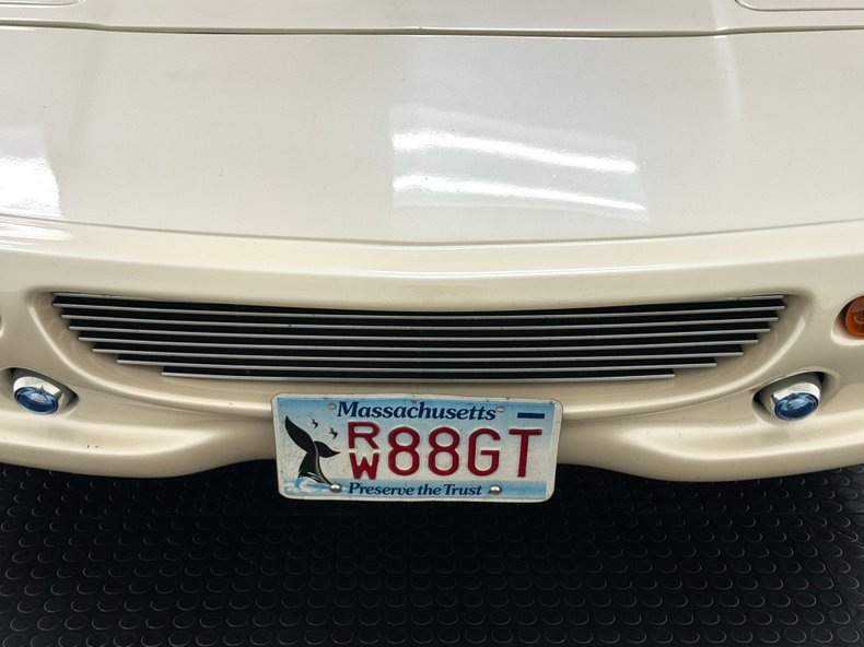 Pontiac-Fiero-1988-Pearl-White-Saddle-13
