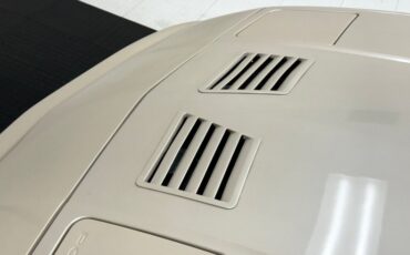 Pontiac-Fiero-1988-Pearl-White-Saddle-14