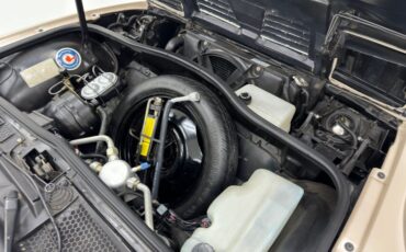 Pontiac-Fiero-1988-Pearl-White-Saddle-30