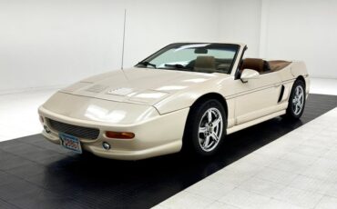 Pontiac-Fiero-1988-Pearl-White-Saddle
