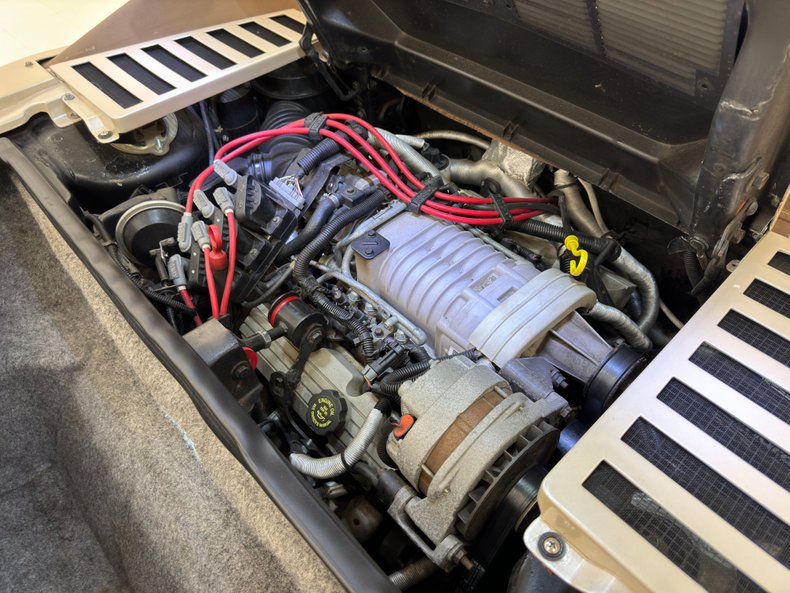 Pontiac-Fiero-1988-Pearl-White-Saddle-41
