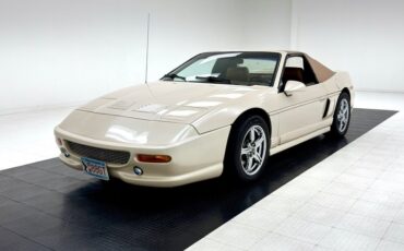 Pontiac-Fiero-1988-Pearl-White-Saddle-45