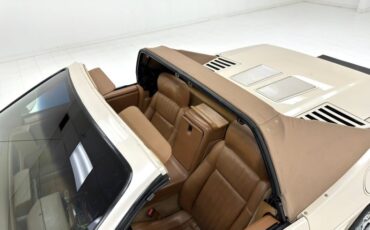 Pontiac-Fiero-1988-Pearl-White-Saddle-46