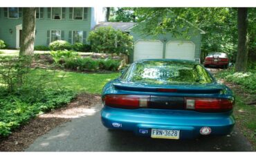 Pontiac-Firebird-1995-Teal-Blue-Metallic-Grey-7