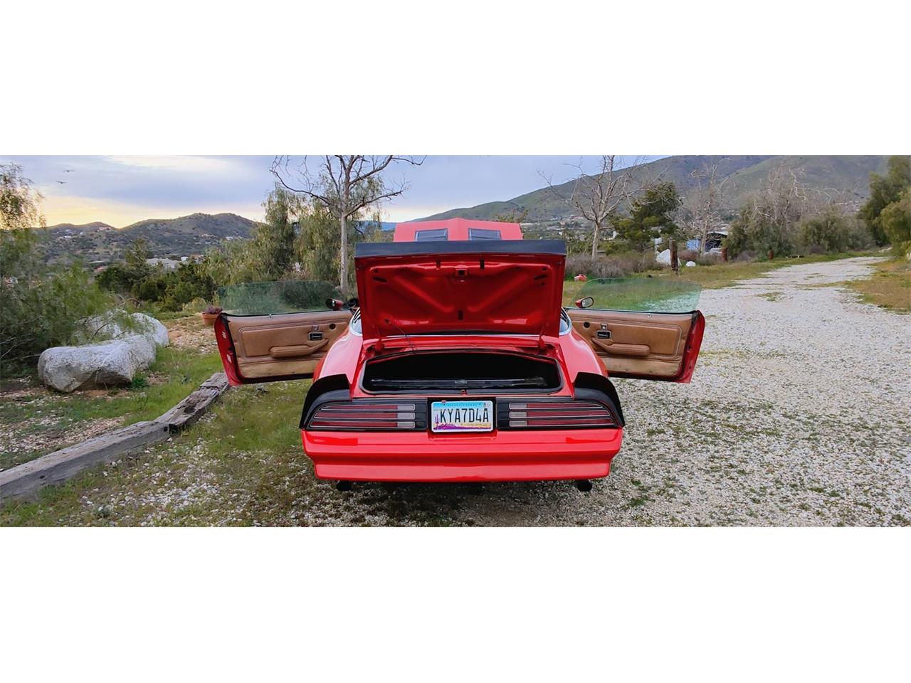 Pontiac-Firebird-formula-1978-Red-with-Black-Strip-Tan-19