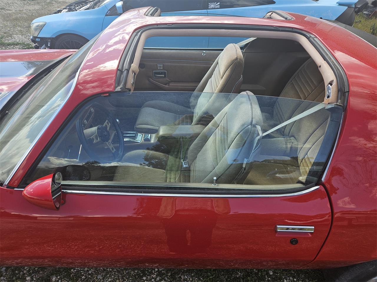 Pontiac-Firebird-formula-1978-Red-with-Black-Strip-Tan-25