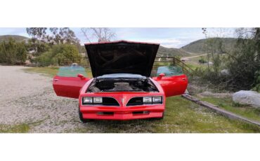 Pontiac-Firebird-formula-1978-Red-with-Black-Strip-Tan-4