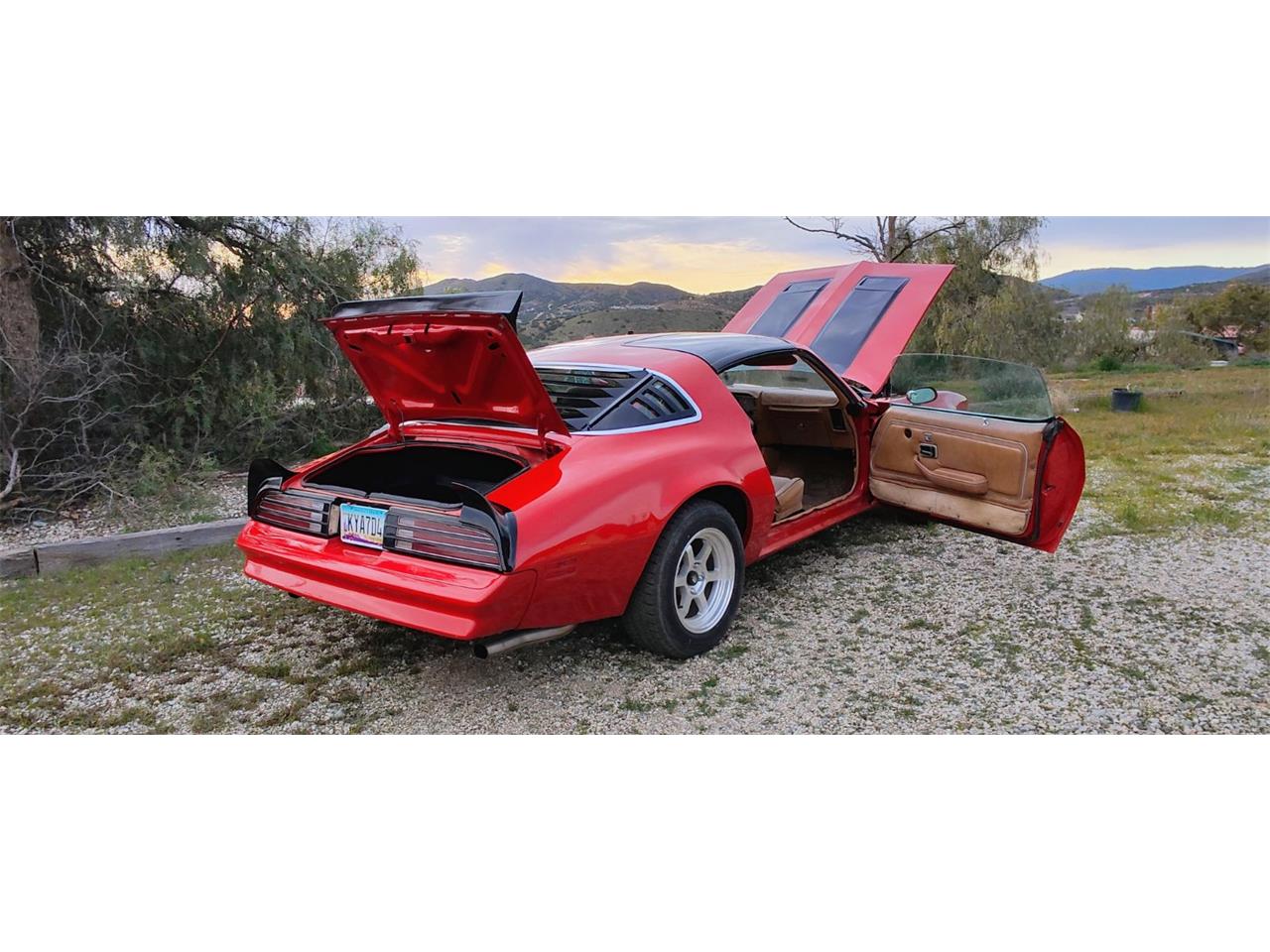 Pontiac-Firebird-formula-1978-Red-with-Black-Strip-Tan-6