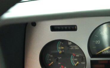 Pontiac-Sunbird-1986-Red-Gray-9