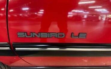 Pontiac-Sunbird-1991-Red-White-12