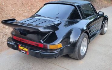 Porsche-911-1977-Black-Tan-8