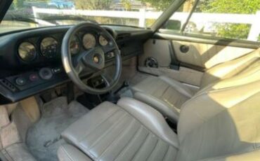 Porsche-911-1983-Ruby-Red-Metallic-Sand-Beige-Leather-11