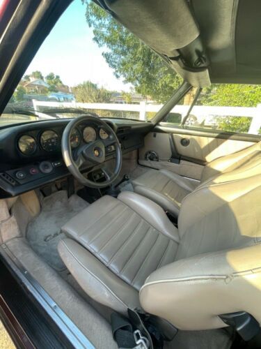 Porsche-911-1983-Ruby-Red-Metallic-Sand-Beige-Leather-11