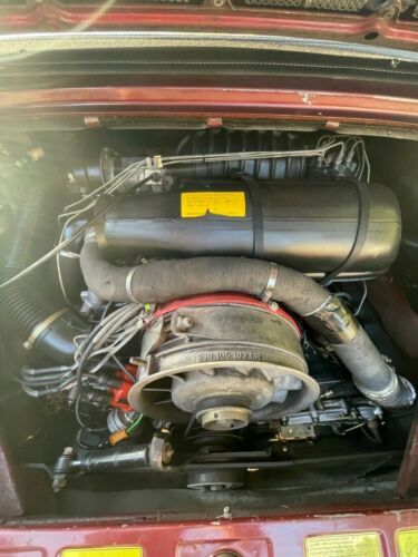Porsche-911-1983-Ruby-Red-Metallic-Sand-Beige-Leather-12