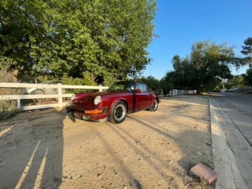 Porsche-911-1983-Ruby-Red-Metallic-Sand-Beige-Leather-14