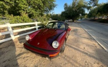 Porsche-911-1983-Ruby-Red-Metallic-Sand-Beige-Leather-3