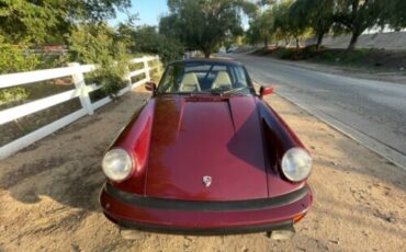 Porsche-911-1983-Ruby-Red-Metallic-Sand-Beige-Leather-6