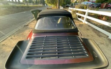 Porsche-911-1983-Ruby-Red-Metallic-Sand-Beige-Leather-8