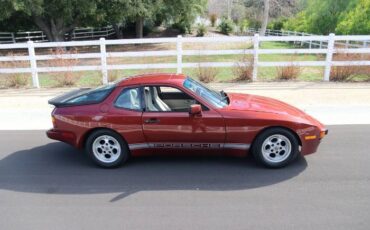 Porsche-944-1986-Garnet-Red-Metallic-Light-Gray-Leather-14