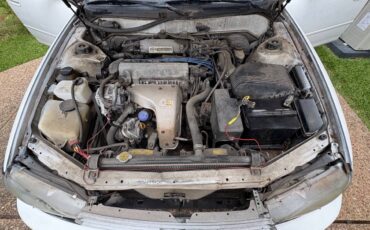 Toyota-Camry-le-4dr-wagon-1992-white-12