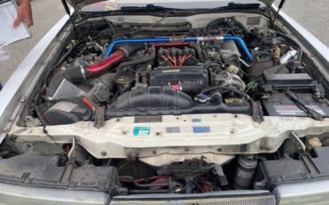 Toyota-Other-1991-WhitePink-Tan-1