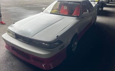 Toyota-Other-1991-WhitePink-Tan-10