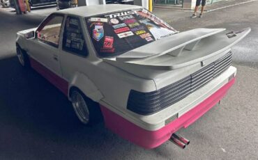 Toyota-Other-1991-WhitePink-Tan-11