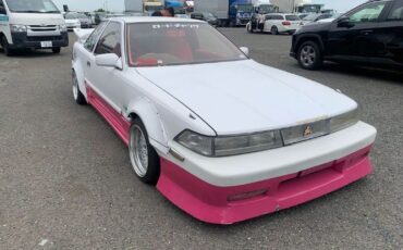 Toyota-Other-1991-WhitePink-Tan-13