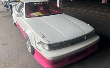Toyota-Other-1991-WhitePink-Tan