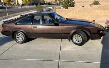 Toyota-Supra-1985-Maroon-Metallic-Maroon