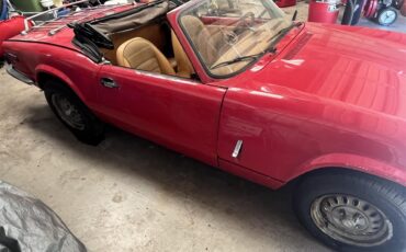 Triumph-Spitfire-1978-Red-Tan-3