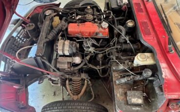 Triumph-Spitfire-1978-Red-Tan