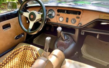 Triumph-Spitfire-1979-British-racing-green-Camel-7