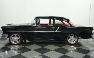 Unknown-150-1956-Black-Red