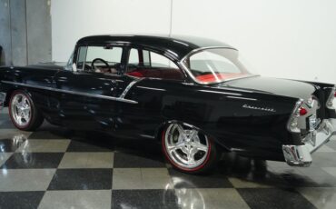 Unknown-150-1956-Black-Red-8