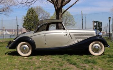 Unknown-170-v-1936-Silver-and-black-Red-1