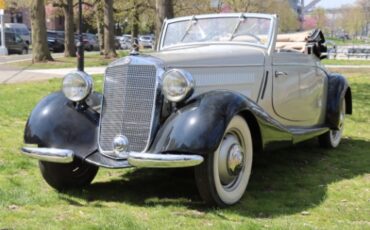 Unknown-170-v-1936-Silver-and-black-Red