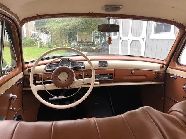 Unknown-190d-1961-Black-Tan-1