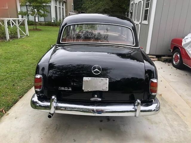 Unknown-190d-1961-Black-Tan-9