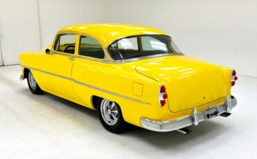 Unknown-210-1953-Yellow-Black-1