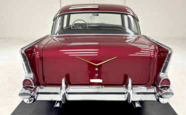 Unknown-210-1957-Ruby-Red-Metallic-Black-1