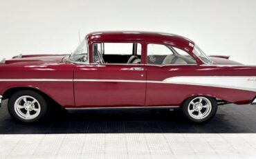 Unknown-210-1957-Ruby-Red-Metallic-Black