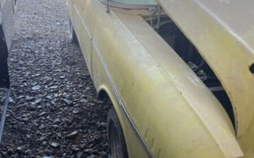 Unknown-210-1957-Yellow-Black-1